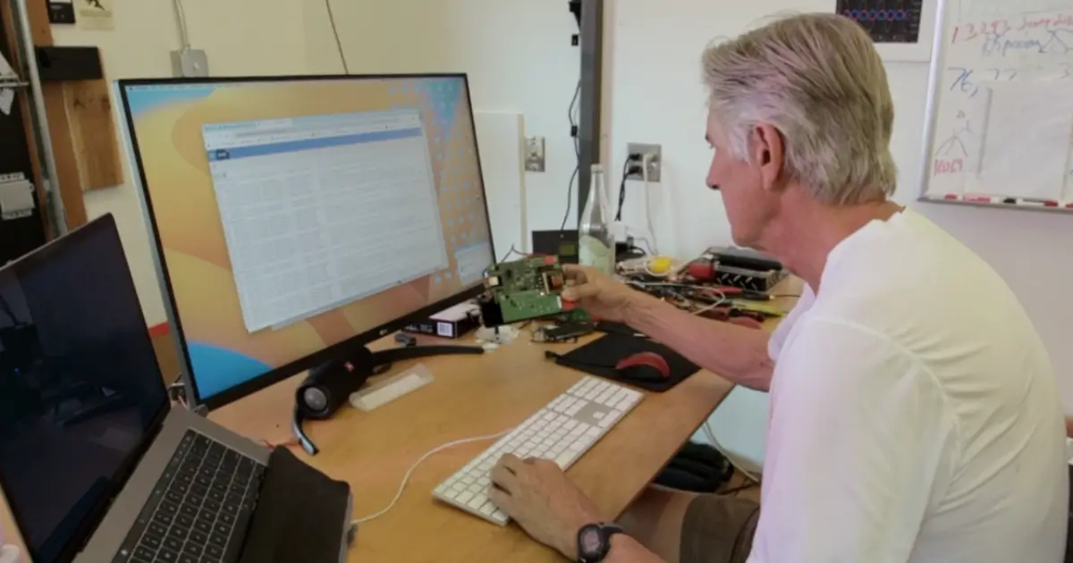 OpConnect engineer testing charging station circuit board hardware