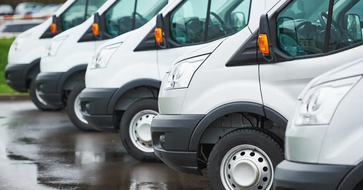 Electric truck charging stations at a delivery fleet depot