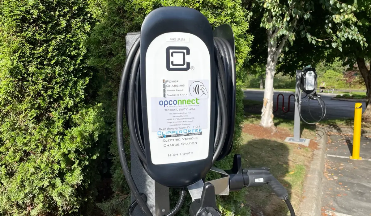 OpConnect EV chargers serving a corporate fleet parking area